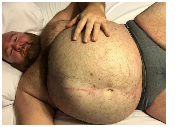 Photo of Meet erotic weight gainer who followers pay $20 a month just to watch him excite them with his massive tummy